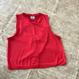 Whitney Simmons x Gymshark 
Coral cropped workout tank top